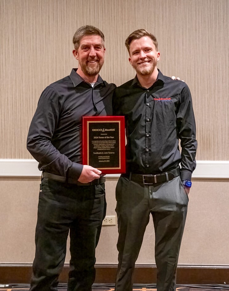 Captains Michael Tucker and Chris Gumm accept the coveted TowBoatUS Tower of the Year Award at the 2025 TowBoatUS Conference in Las Vegas. (credit: Stacey Nedrow-Wigmore/BoatUS)